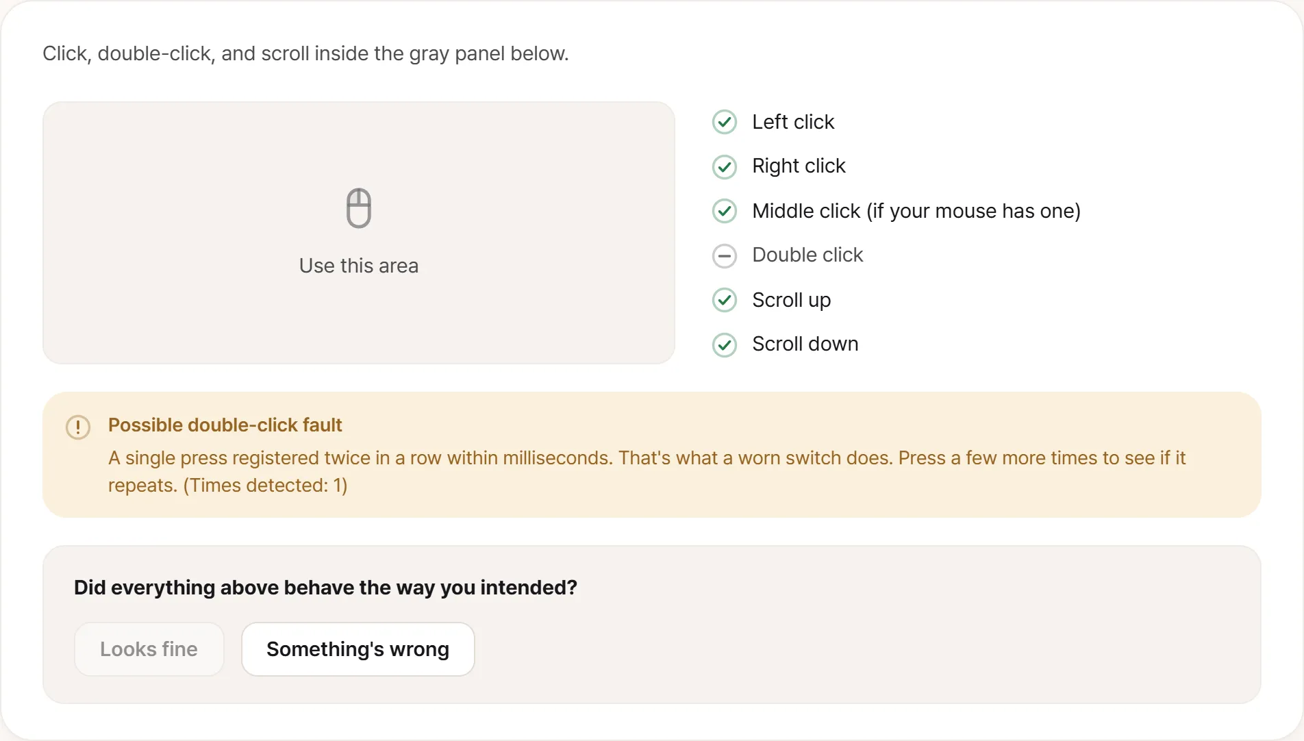Mouse test screen. The button and wheel checks are ticked, and a warning below reads “Double-click may be misfiring — one press arrived twice in quick succession”, with a count of how many times it happened.